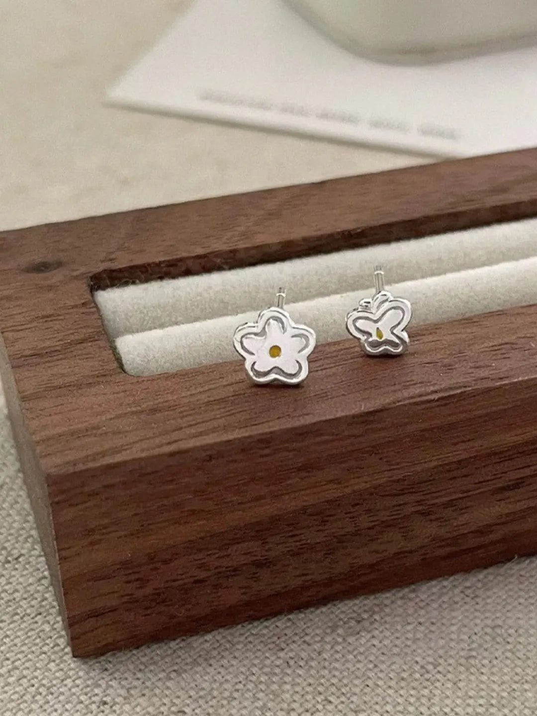 ASYMMETRIC FLOWER STUDS