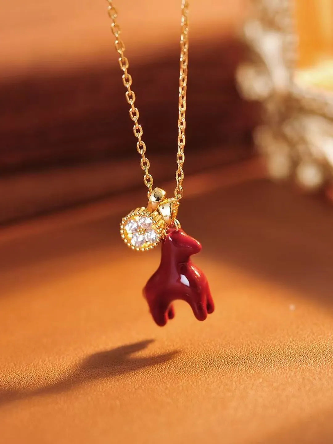 GOLD COIN PONY NECKLACE