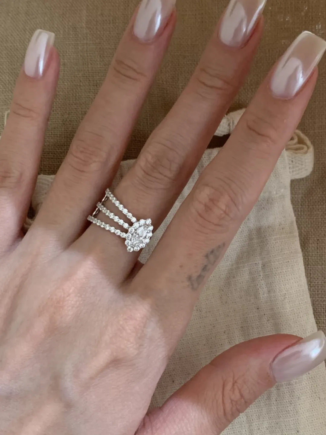 TRIPLE MARQUISE RING