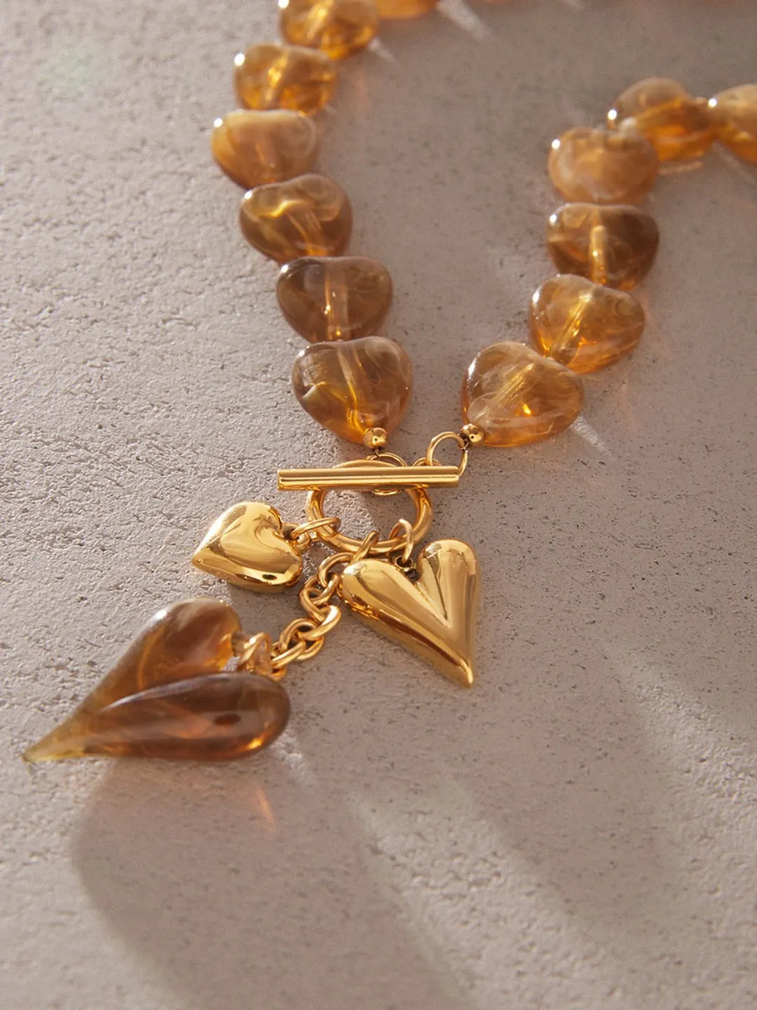 MOCHA CHARM NECKLACE