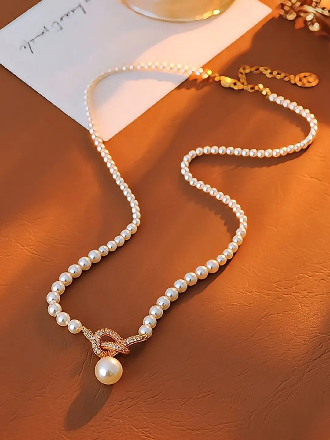 TIED PEARL NECKLAC