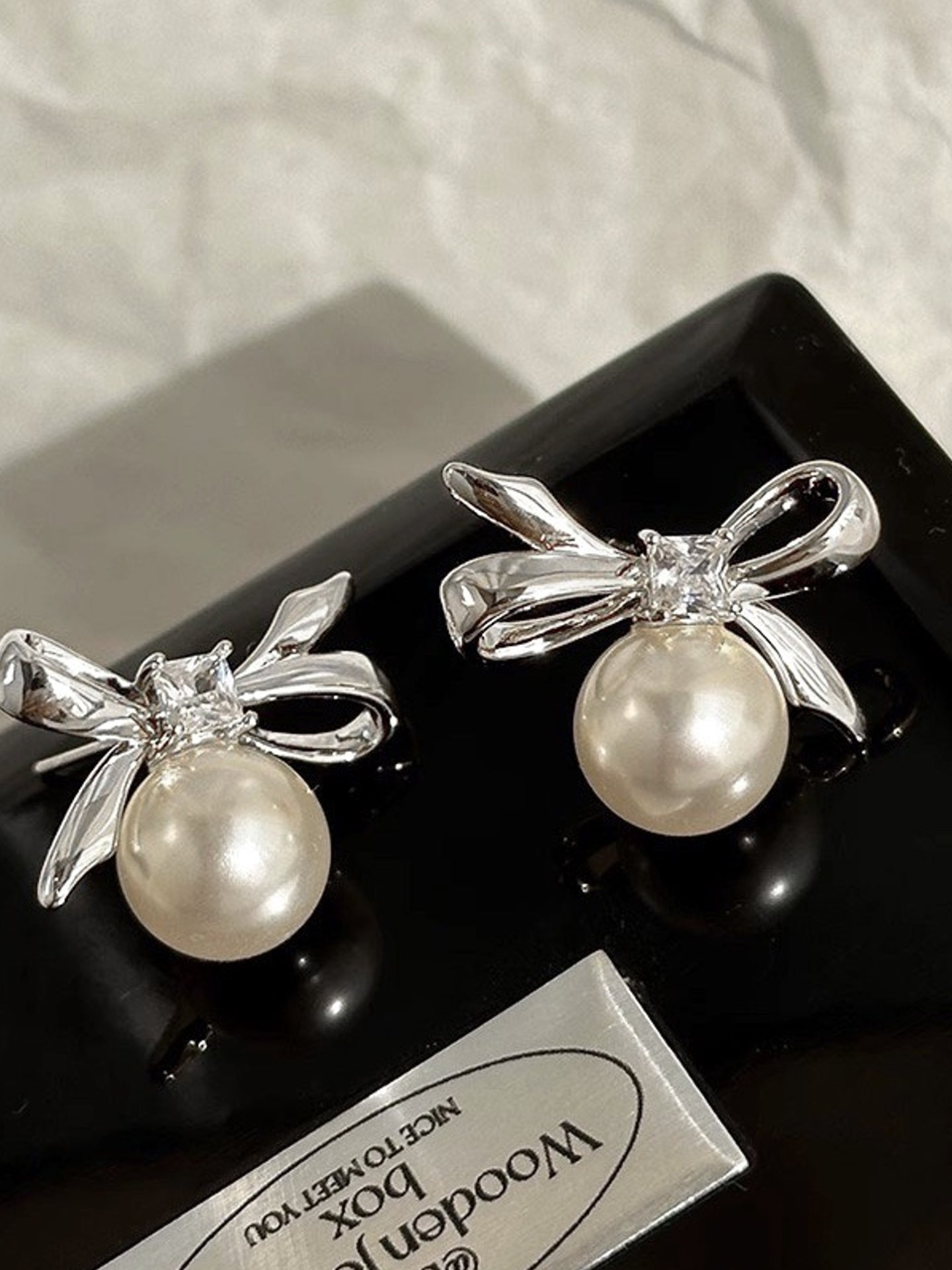BOW PEARL EARRINGS