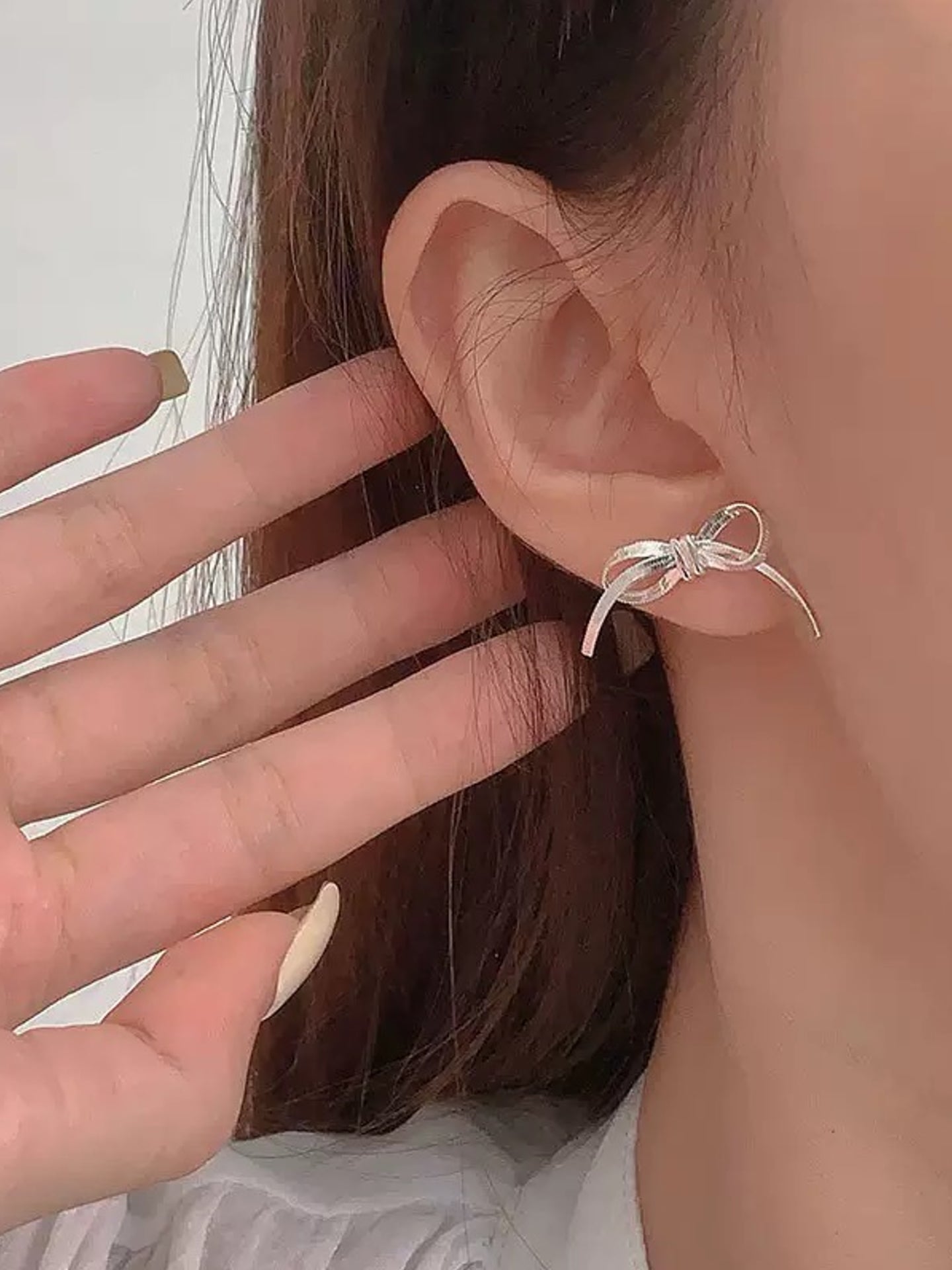 COLLIER À ARC ET LAME