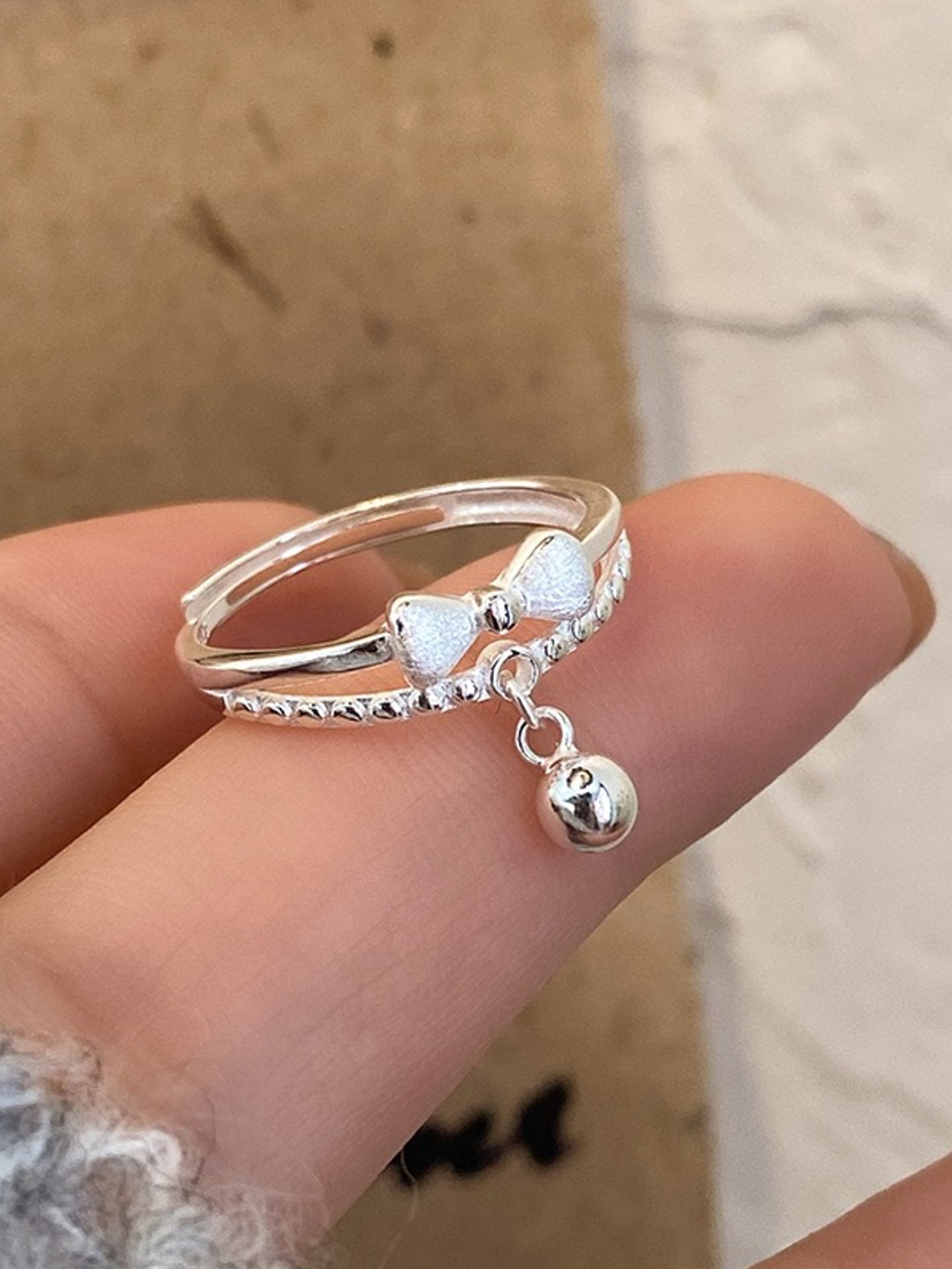 TWO-LAYER BOW RING