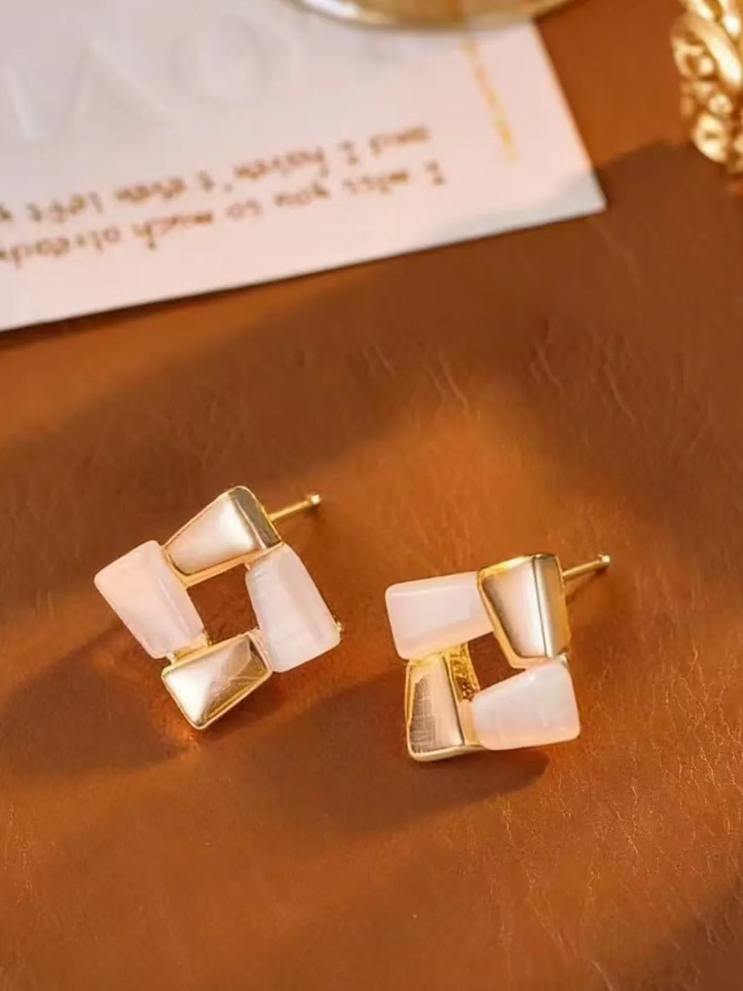 MOTHER PEARL STUDS