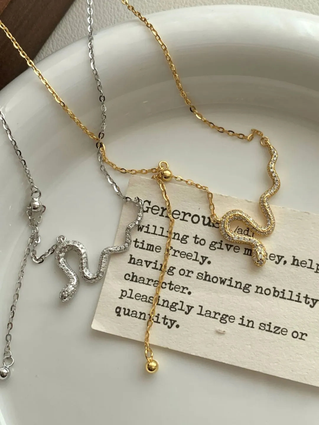 SERPENT SILVER TASSEL