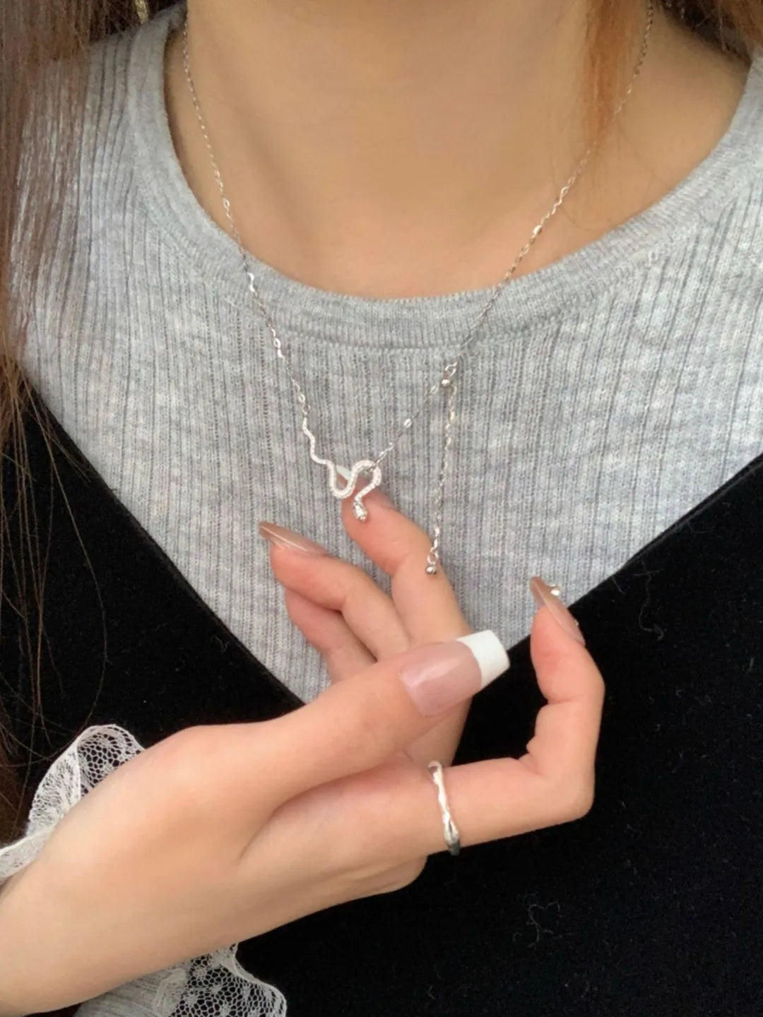 SERPENT SILVER TASSEL