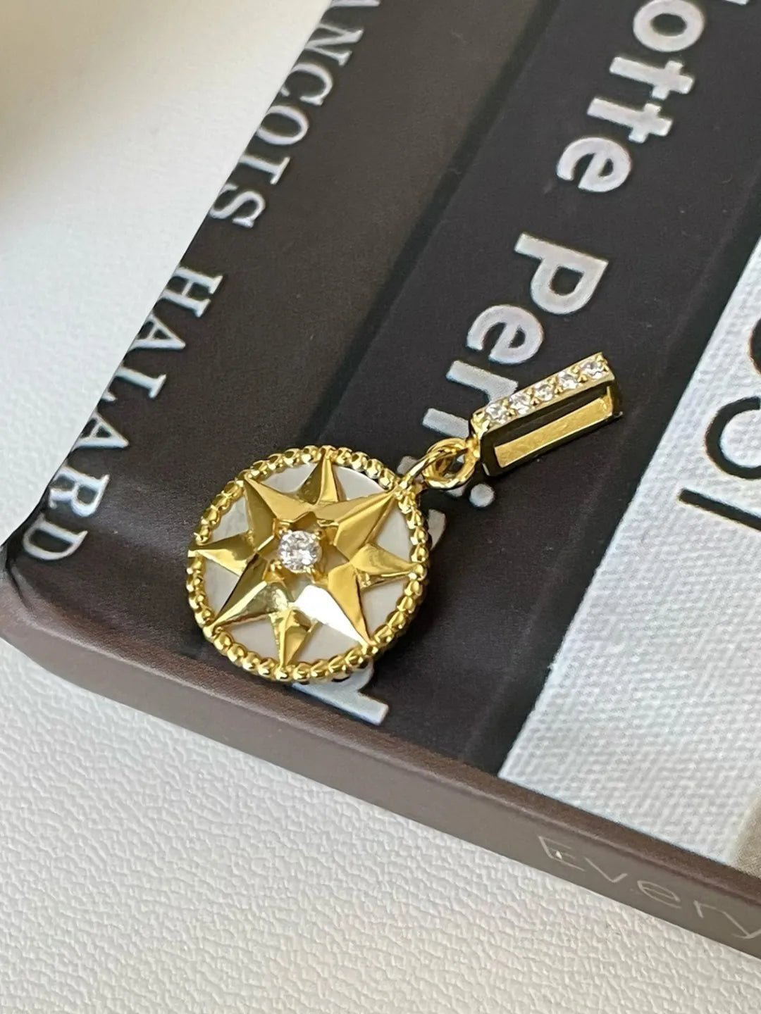CZ COMPASS STAR PENDANT