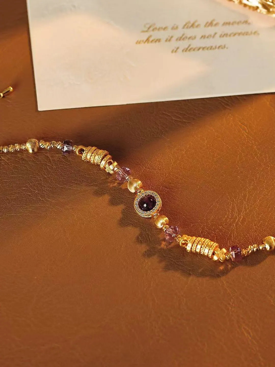 PURPLE BEAD BRACELET